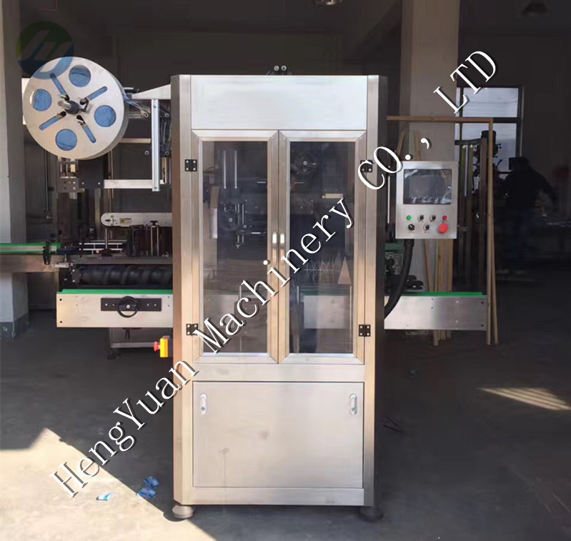 automatic shrink sleeve label applicator