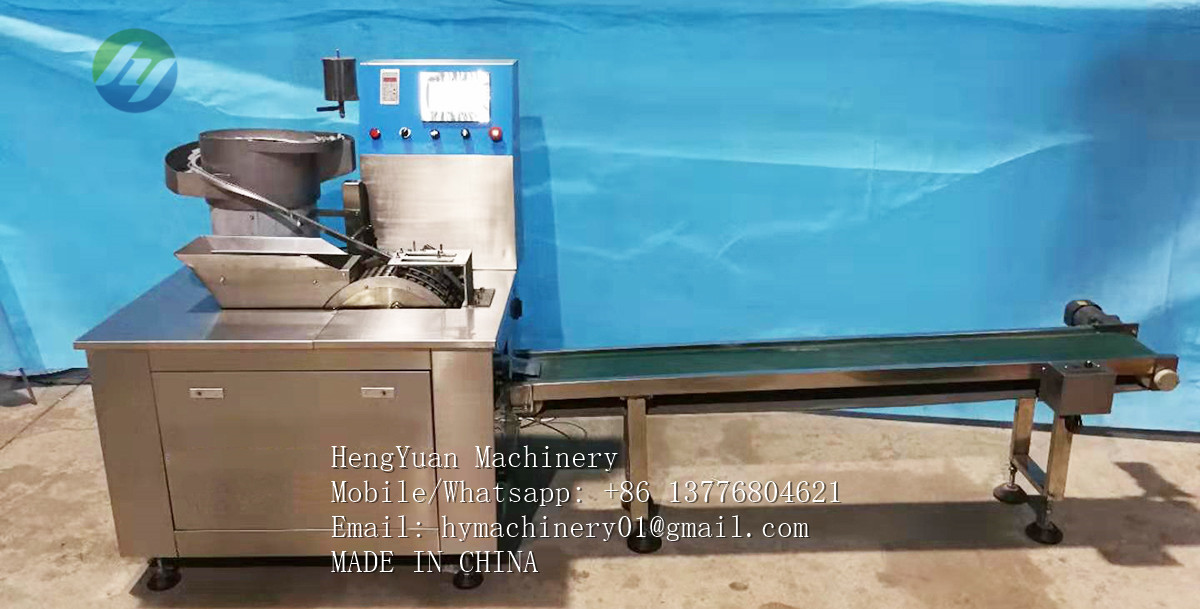 Automatic saliva suction tube and tip capping combination machine